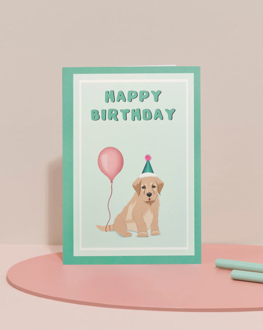 'Puppy with balloon' card in green